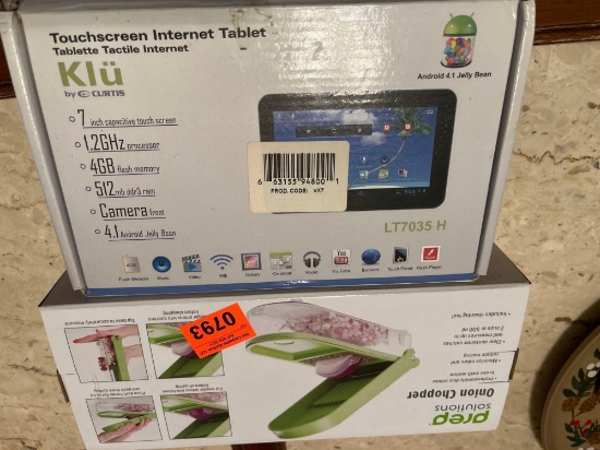 Onion, chopper, touchscreen Internet tablet still in cellophone 7 inch capacity 1.2 GHz processor 4