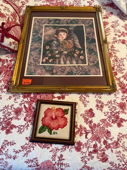 Wall picture of an angel 22 inches tall 17 1/2 inches wide smaller embroidery picture is over flower