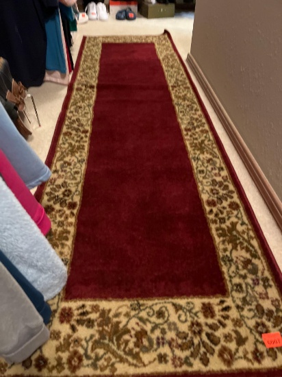 Rug is 7 foot 7 inches long x 2 foot two wide