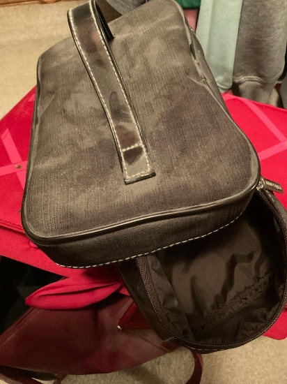 Bag 13 inches long 10 inches tall 4 inches wide. Red makeup bag and smaller brown makeup bag.