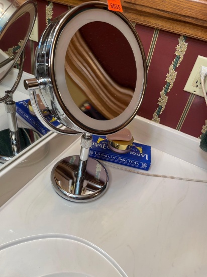 Touch mirror to turn light on facial soap, and other soaps