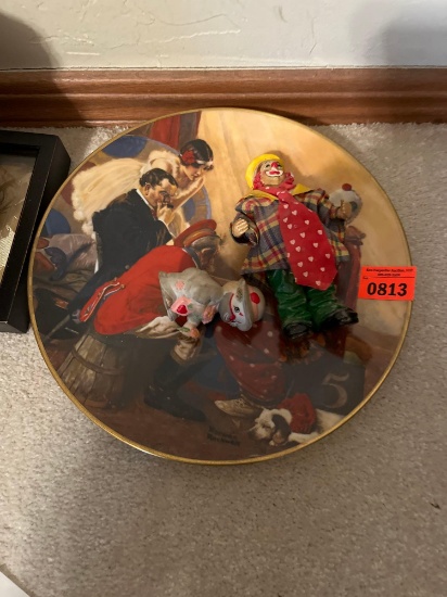 Plate with clown on it and two wall decor, clowns music box, and various cards like birthday cards