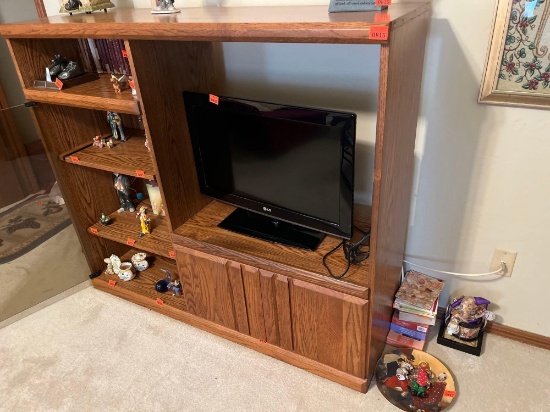 Entertainment center 55 inches wide 17 inches deep 48 inches high all contents so separate lots.