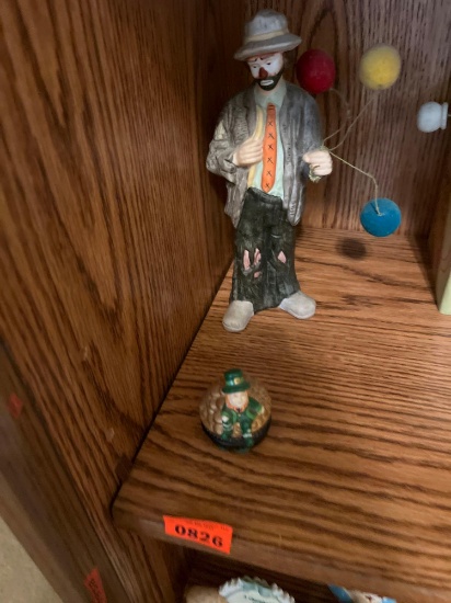 Home decor, leprechaun, set on gold pot clown carrying three balloons