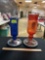 1 Vintage Red Bottle and 1 Vintage Blue Bottle Turned into Humming Bird Feeders