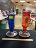 1 Vintage Red Bottle and 1 Vintage Blue Bottle Turned into Humming Bird Feeders