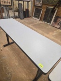 Adjustable Height, 45 Inch Long, 11 Inch Wide Table.