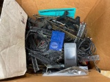 Box Full of Assorted Toy Train Tracks and Parts