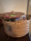 Small basket of sewing supplies