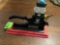 Vintage nutcracker cast iron king with wooden base.