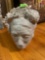 Home decor art made out of artificial fossil made to look like a persons head
