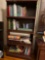 Bookshelf with glass pull up doors