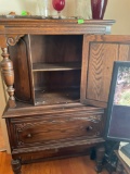 Antique court cabinet buyer, responsible for loading so bring your own help to load solid wood.