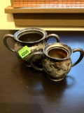 Vintage sugar and creamer bowls they both have prints on the bottom shown in picture