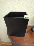small black wooden trash can