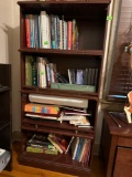 Bookshelf with glass pull up doors
