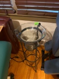 Hand blown glass vase with metal stand