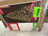 Artificial Christmas Tree in box. Pre-lit