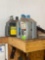 Various oils and chemicals 4 full 1 Half full 1 Almost empty