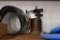 Items on shelf to include hose for air and antique burner torch and more