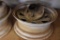 2 vehicle rims and axle hubs