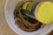 Bucket with rope and bungees