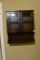 Small wooden 2 door cabinet with bottom shelf.