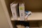 2 new wii wheels and a wii pistol attachment