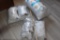 5 bags of various sizes of batting