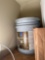 Partial 5 gallon bucket of paint and water filters