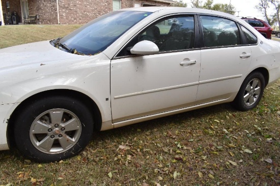 2007 Chevy Impala LT white with cloth seats,......177149 miles. Clean title runs and drives one owne