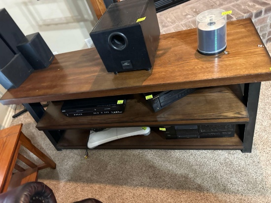 Entertainment stand will hold a TV directly on the stand.... Items on the stand NOT included. Must