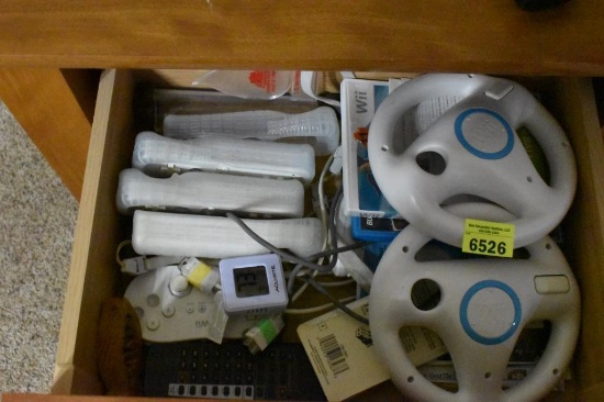 Wii steering wheels and controllers and a few games.