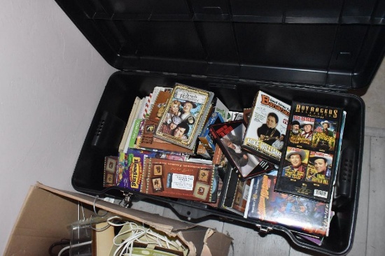 Black tote of older VHS tapes, and a couple DVDs
