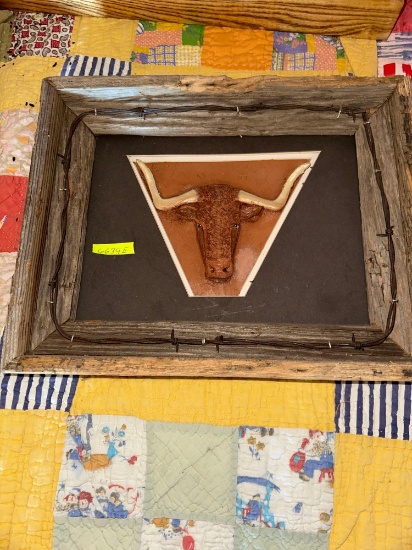 Embossed leather bull hand done