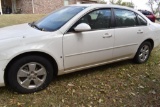 2007 Chevy Impala LT white with cloth seats,......177149 miles. Clean title runs and drives one owne