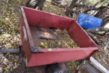Pull behind small metal wagon with dump