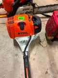 Gas powered Stihl...brush hog weed eater