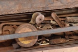 Metal tool box with a few hand tools inside