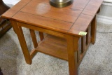 Wooden end table with a small shelf on the bottom. Must bring help to load.