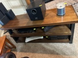 Entertainment stand will hold a TV directly on the stand.... Items on the stand NOT included. Must