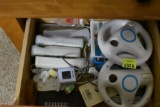 Wii steering wheels and controllers and a few games.