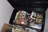 Black tote of older VHS tapes, and a couple DVDs