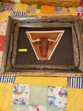 Embossed leather bull hand done