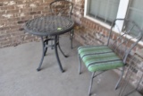 Metal table and 2 chairs Must bring help to load.
