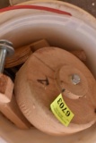Bucket of wood pieces