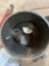 Bucket of various items including a wrench