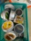 Small containers of various wood chips