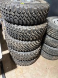 5 Matching Jeep 5 lug wheels and NEW tires. LT255/75R17