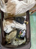 Suitcase filled with various cups and mugs
